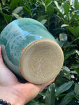speckled blue urn shaped planter