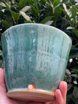 speckled blue urn shaped planter